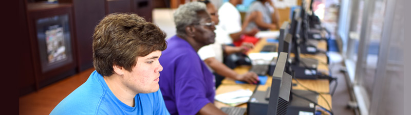 Folks using computers at Bolivar County Library System